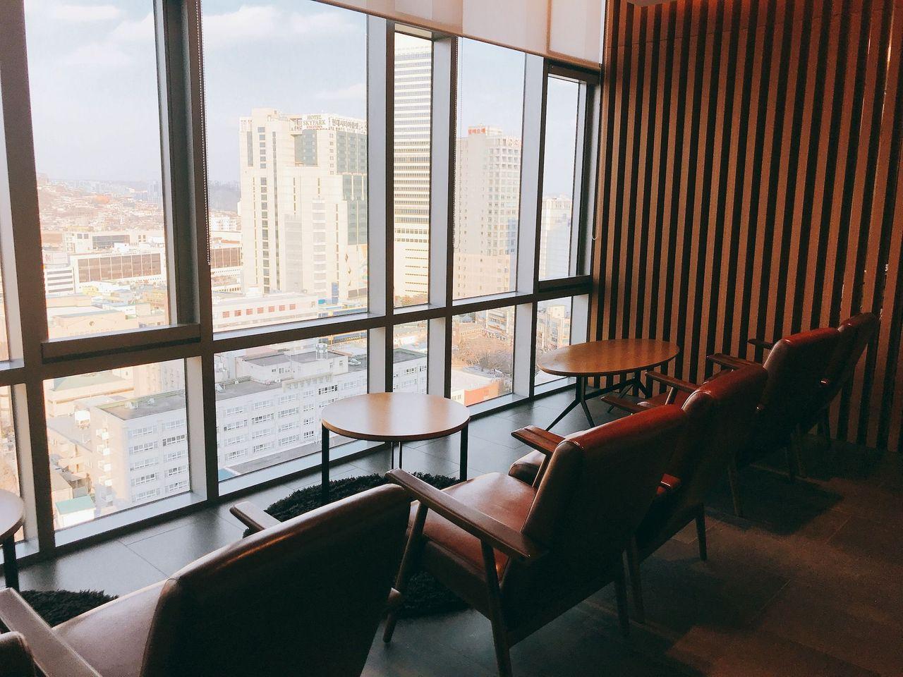 Stunning city view from the panoramic windows in the executive lounge at Dongdaemun Novotel Ambassador Hotel.